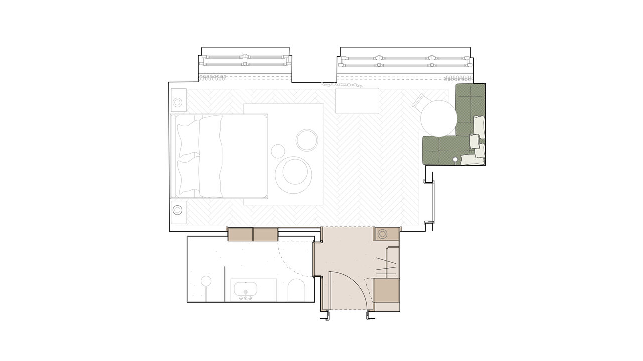 The floor plan of a large hotel room in the Hotel Château Royal in Berlin, which has a bedroom with a seating area and a bathroom.