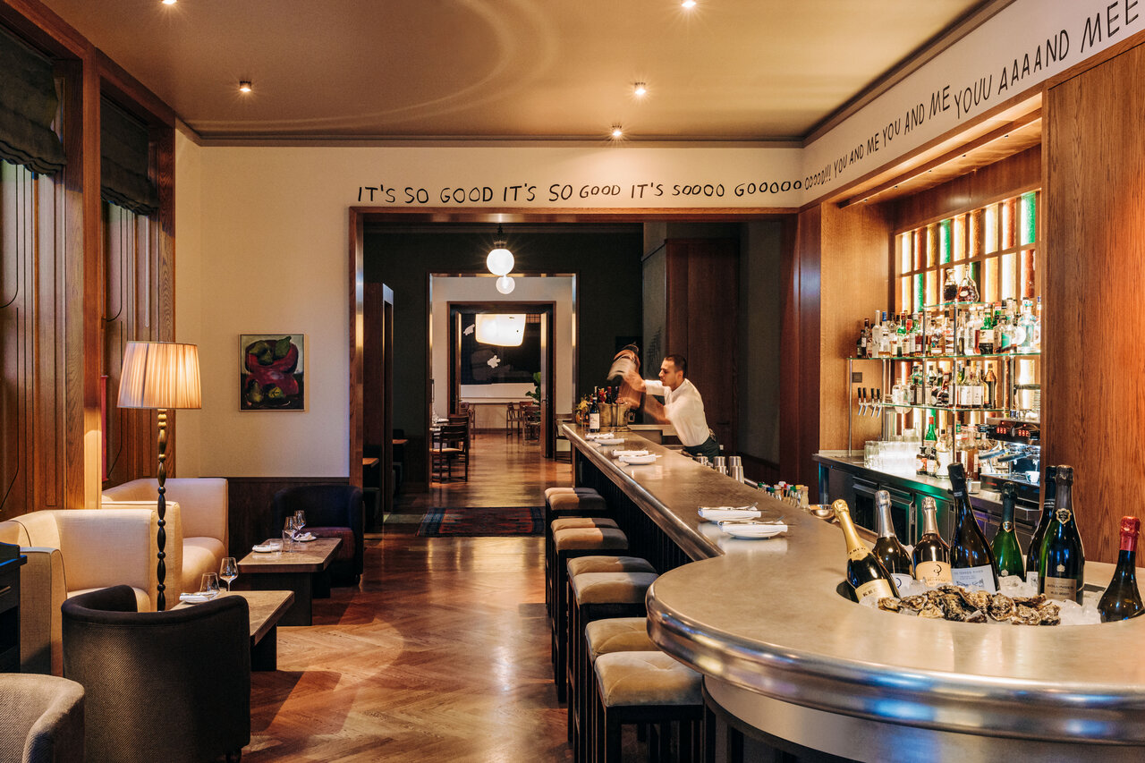 View of the bar counter of the boutique hotel Château Royal in Berlin Mitte, where works of art by various artists are exhibited.